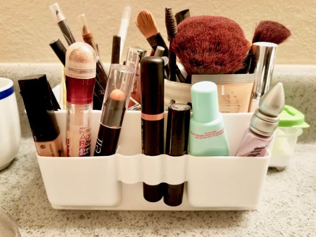 We're showing off our makeup storage in this edition of Keeping it Real. As bloggers we like to show the real us, not just the post perfect side. Readers asked to see how we organize our makeup so we're revealing our easy to imitate, storage solutions from cosmetic bags, to drawer inserts, and counter top caddies. | We Three Shanes