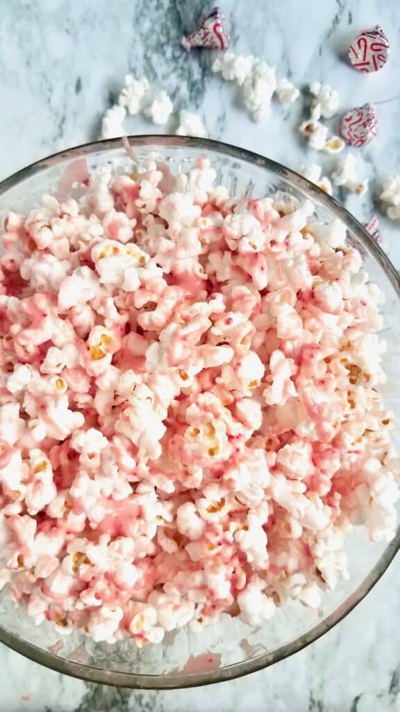 Big Bowl of pink popcorn (white chocolate and peppermint topped) popcorn