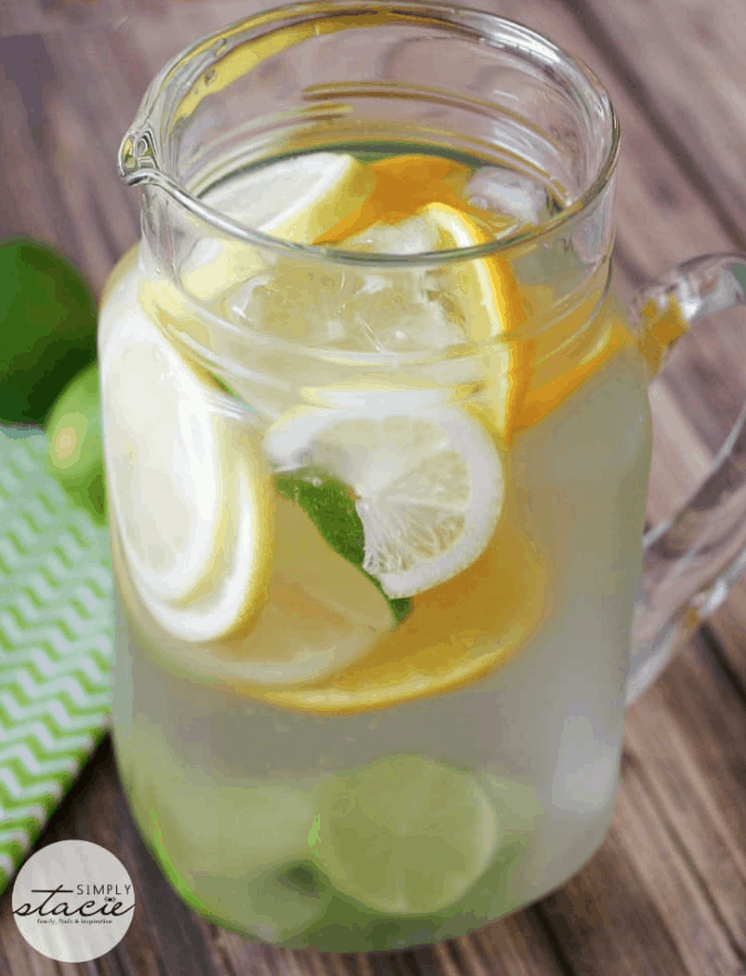 Citrus Bliss Infused Water is a refreshing way to stay hydrated this Summer. Check out this recipe and 16 other Flavored Water Recipes by clicking the link! | We Three Shanes