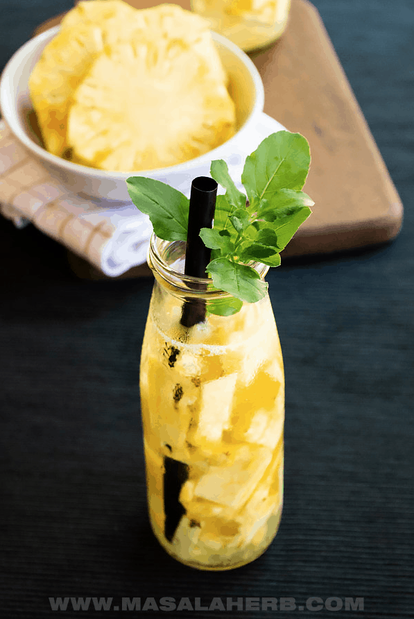 Fresh Pineapple Water is a refreshing way to stay hydrated this Summer. Check out this recipe and 16 other Flavored Water Recipes by clicking the link! | We Three Shanes