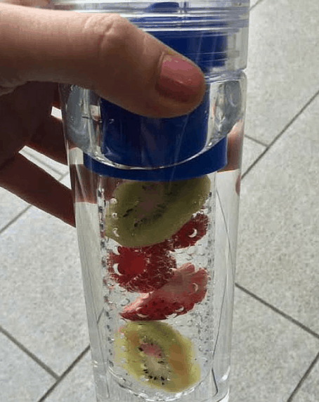 Raspberry Kiwi Strawberry Infused Water is a refreshing way to stay hydrated this Summer. Check out this recipe and 16 other Flavored Water Recipes by clicking the link! | We Three Shanes