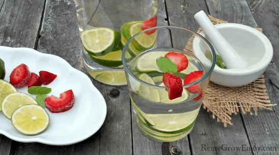 Strawberry Lime Mint Flavored Water is a refreshing way to stay hydrated this Summer. Check out this recipe and 16 other Flavored Water Recipes by clicking the link! | We Three Shanes