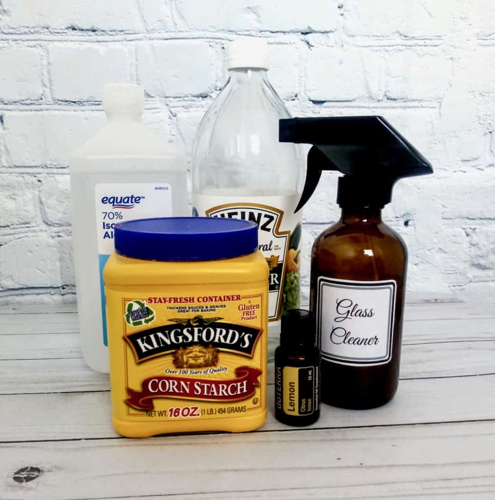 DIY glass cleaners can leave streaks behind but not this one. It has a secret ingredient that leaves a perfect, streak free shiny using all natural ingredients. | We Three Shanes