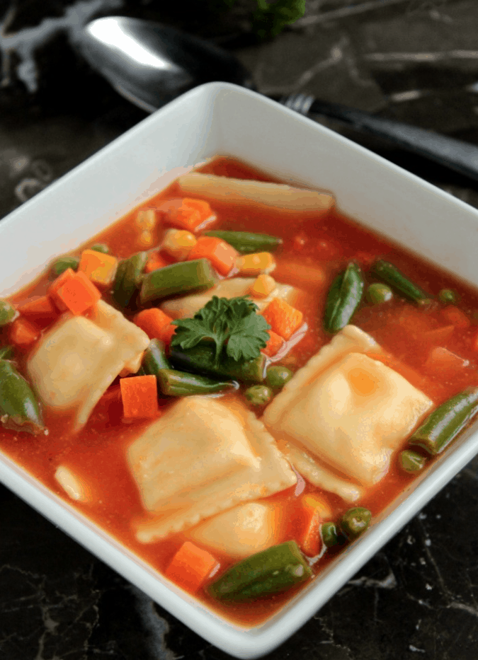 5 ingredient Ravioli Soup is a healthy meal that uses frozen veggies to make a quick dinner. | We Three Shanes