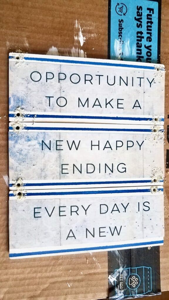 Anyone can make this cute wood pallet quote sign. " Every day is a new Opportunity to make a new happy ending."