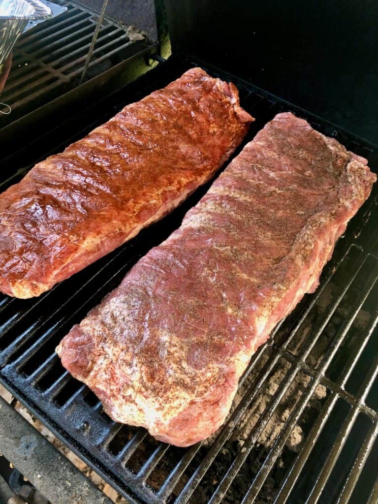 These savory Pumpkin Spice Ribs are the prefect fall dinner. Smoke them, grill them, or cook them in the oven, those pumpkin flavors always turn out absolutely delicious! | We Three Shanes