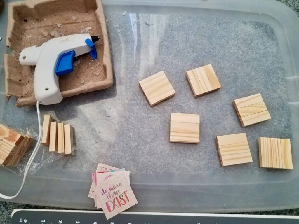 Use Dollar Tree jenga blocks and calendars to make the cutest magnets and ornaments. A super easy craft that makes great DIY gifts. | We Three Shanes