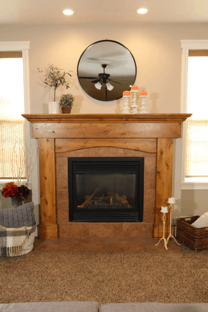 Learn these simple tips and tricks for decorating your fireplace mantel like a professional while still showing off your personal style. | We Three Shanes