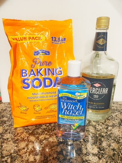 Baking soda, Witch Hazel or grain alcohol can be used to make this room spray. 