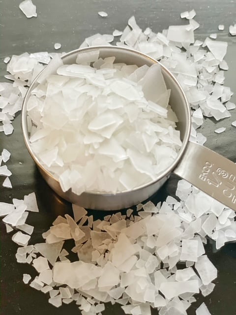 Magnesium flakes are used to melt into water to create a magnesium brine which is then whipped into our DIY body butter | We Three Shanes 