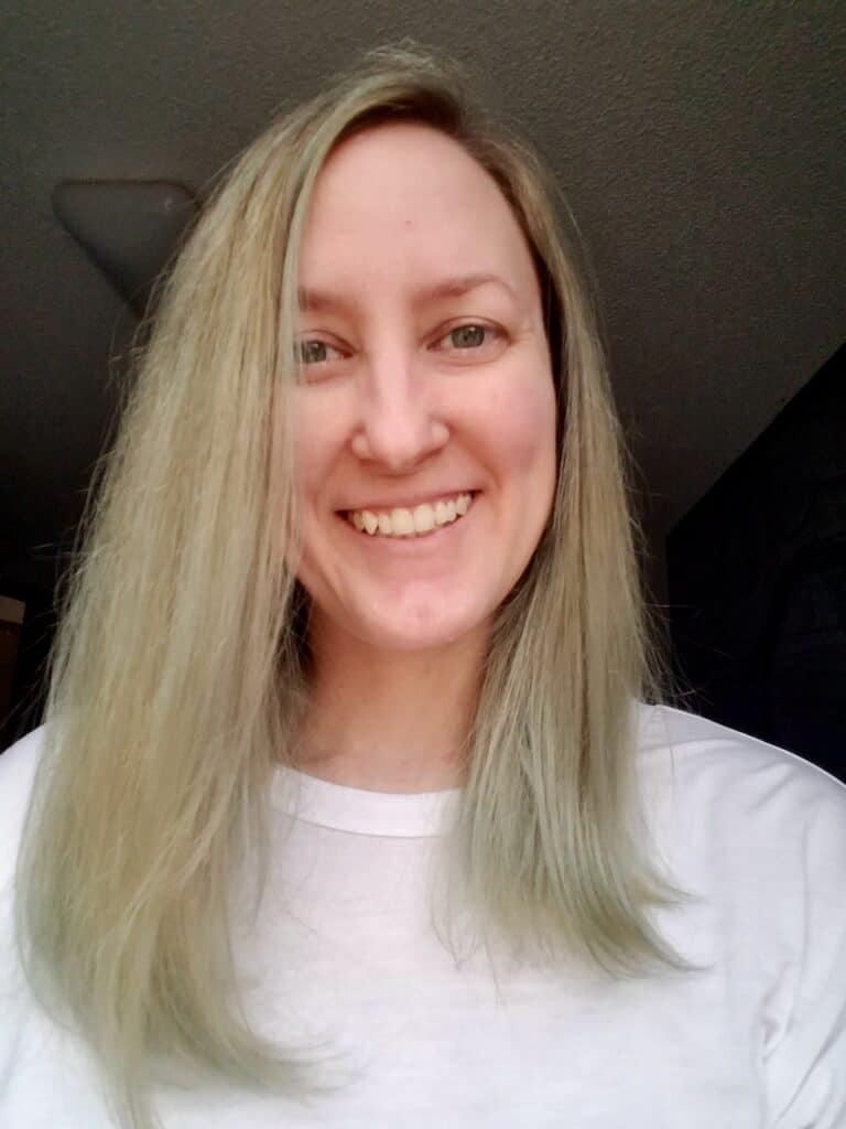 After lightening hair more and trying Overtone Silver again, I got similar results. Ashy blonde and green hair. 