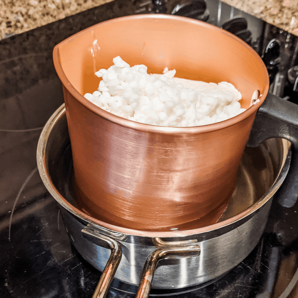 Soy wax melting in Candle Making Pouring Pot