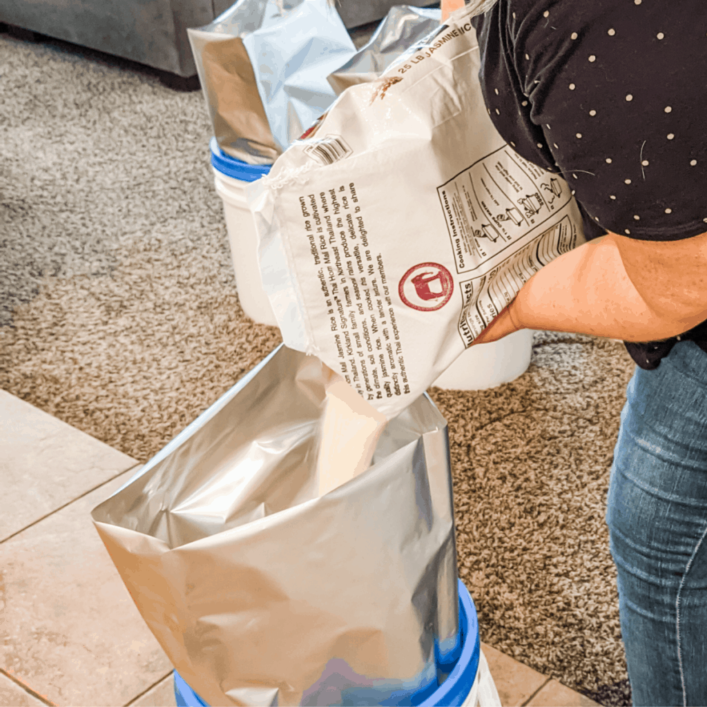 Adding rice to mylar bags for long term food storage.