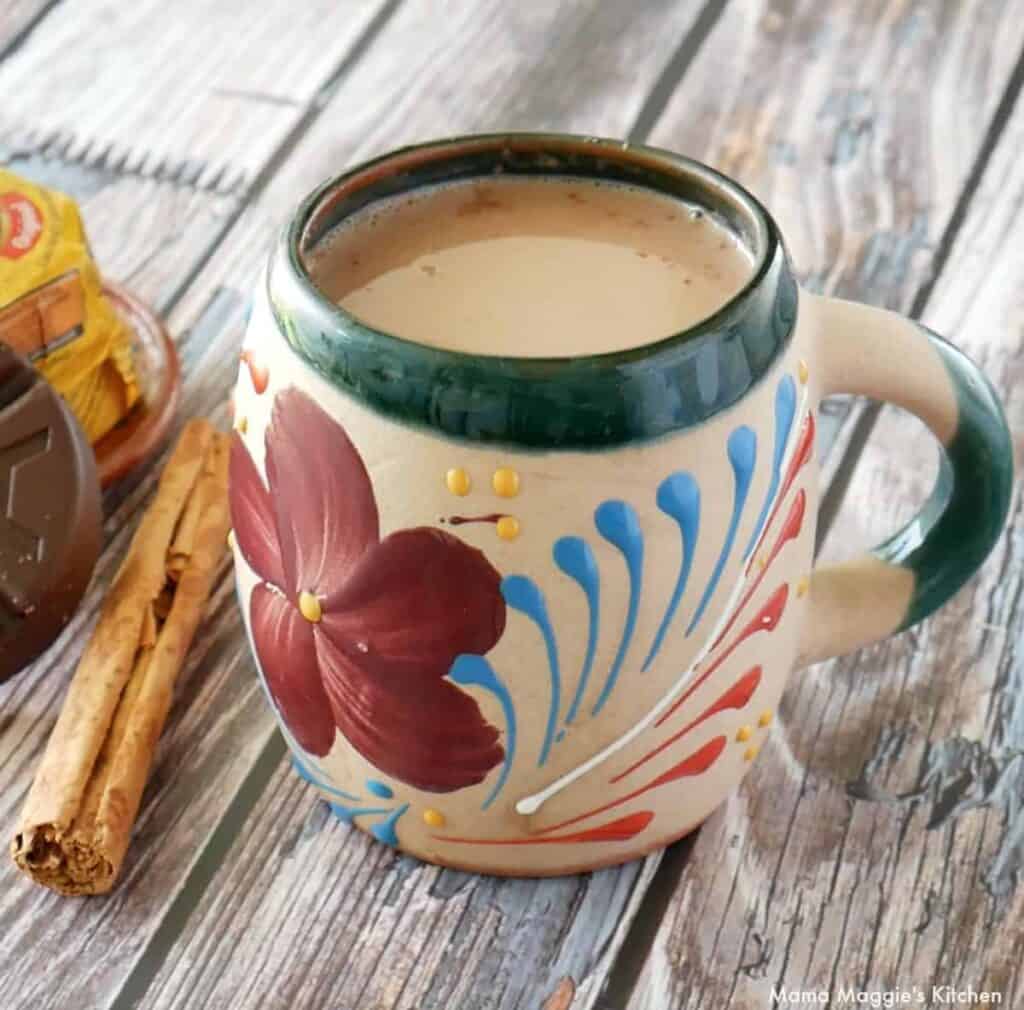 Chocolate drink in a Mexican Mug with flower design.