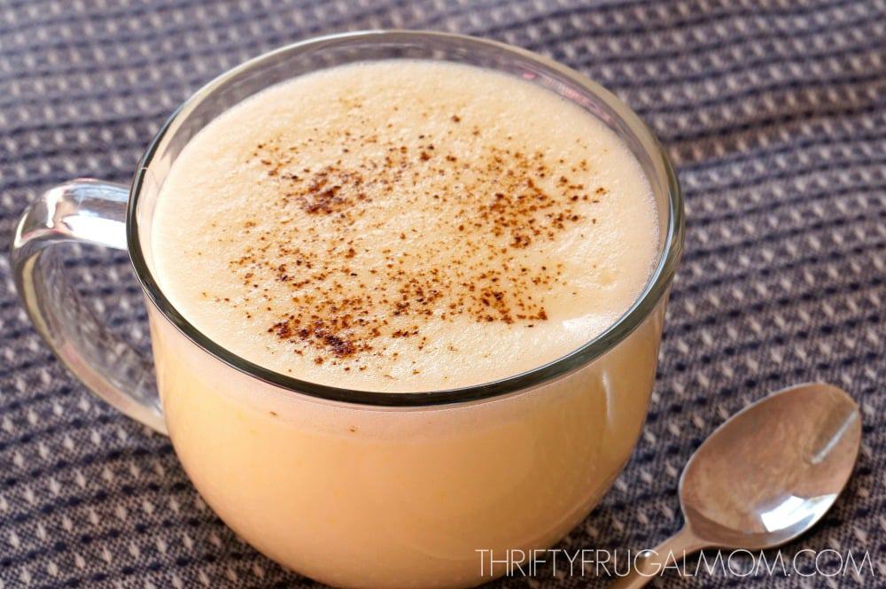 Creamy, light brown drink in a clear mug