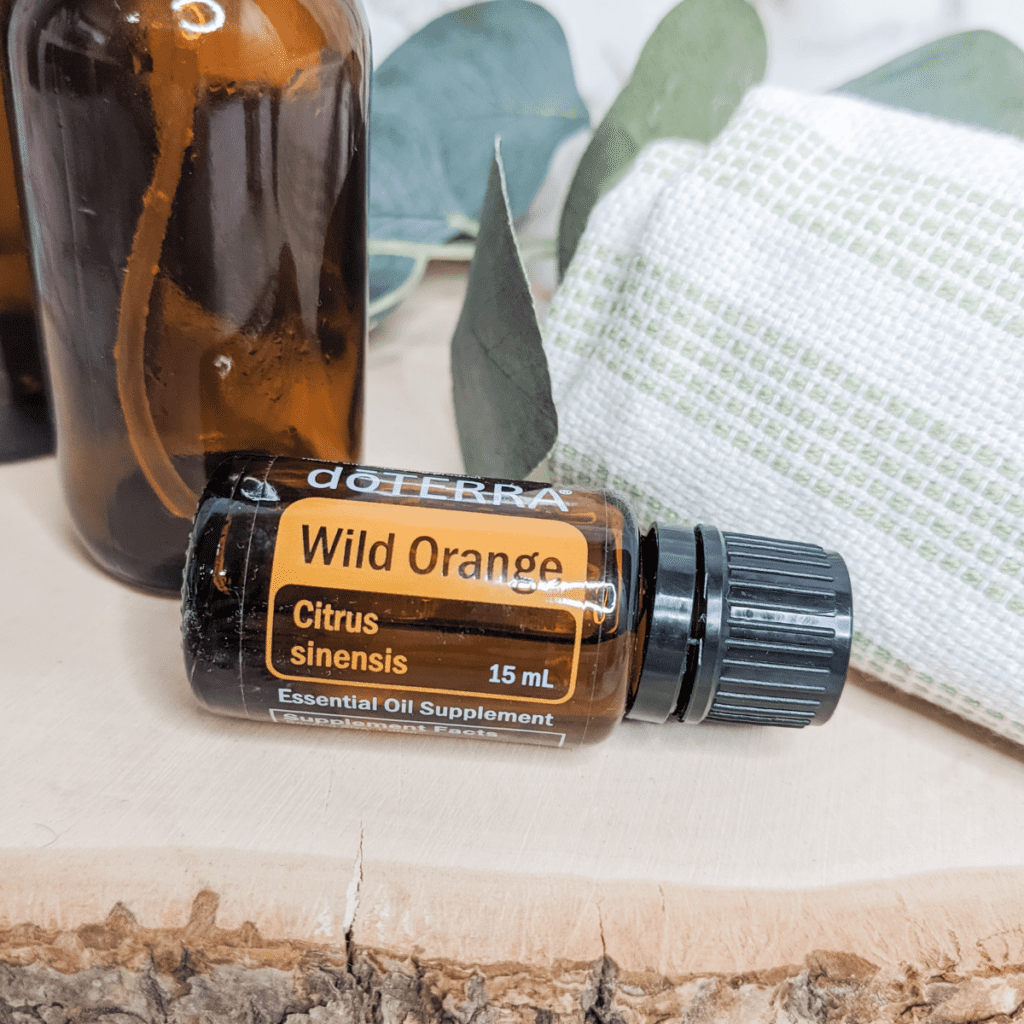 Wild Orange essential oil, used in cleaning.