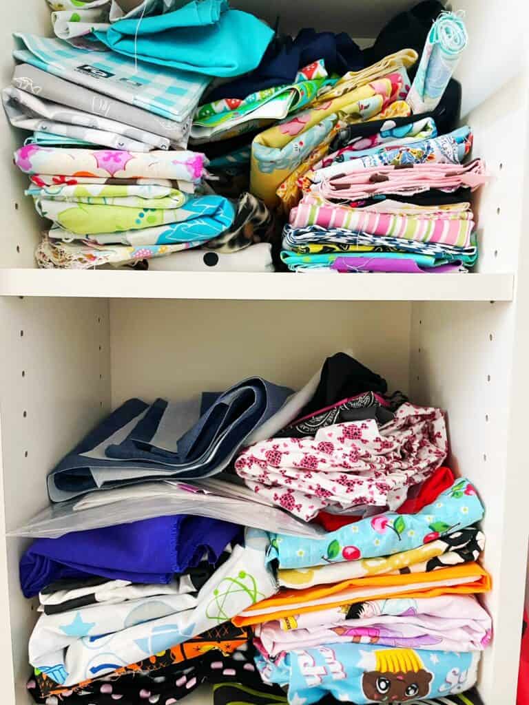 Stacks of fabrics in a cabinet 