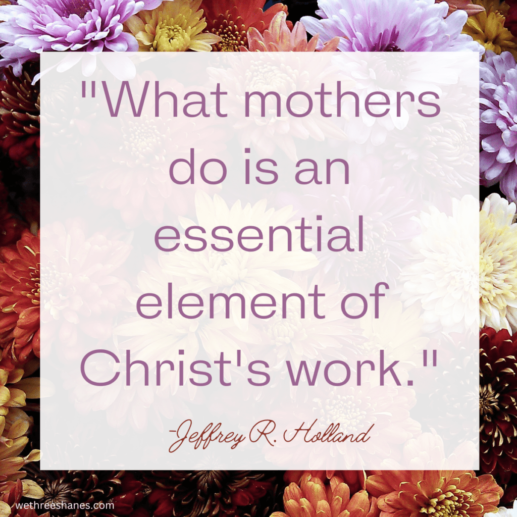 Quote about mothers on a background of colorful flowers.