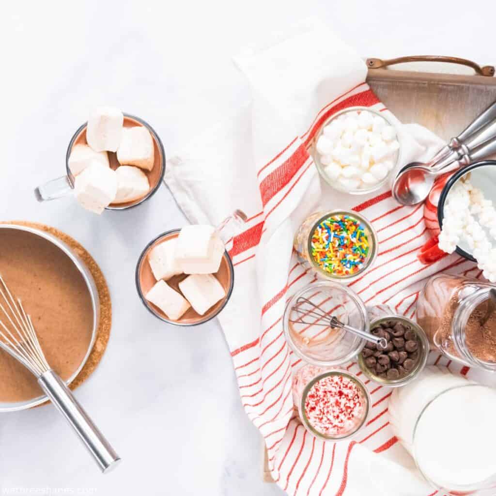 Hot chocolate bar all set up with hot chocolate and lots of toppings.