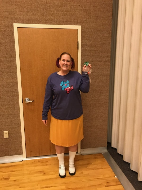 Woman dressed as Darla from the movie Finding Nemo. 