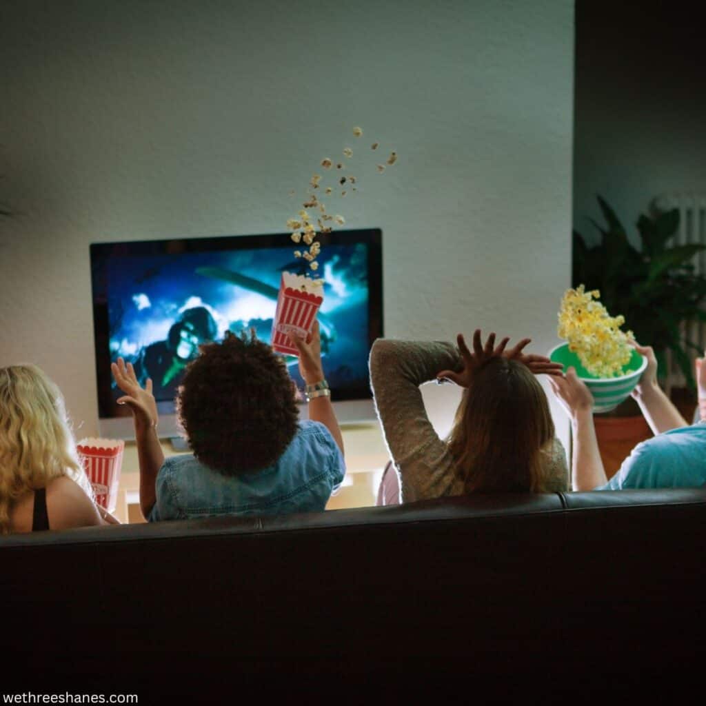 4 teens watching a scary movie