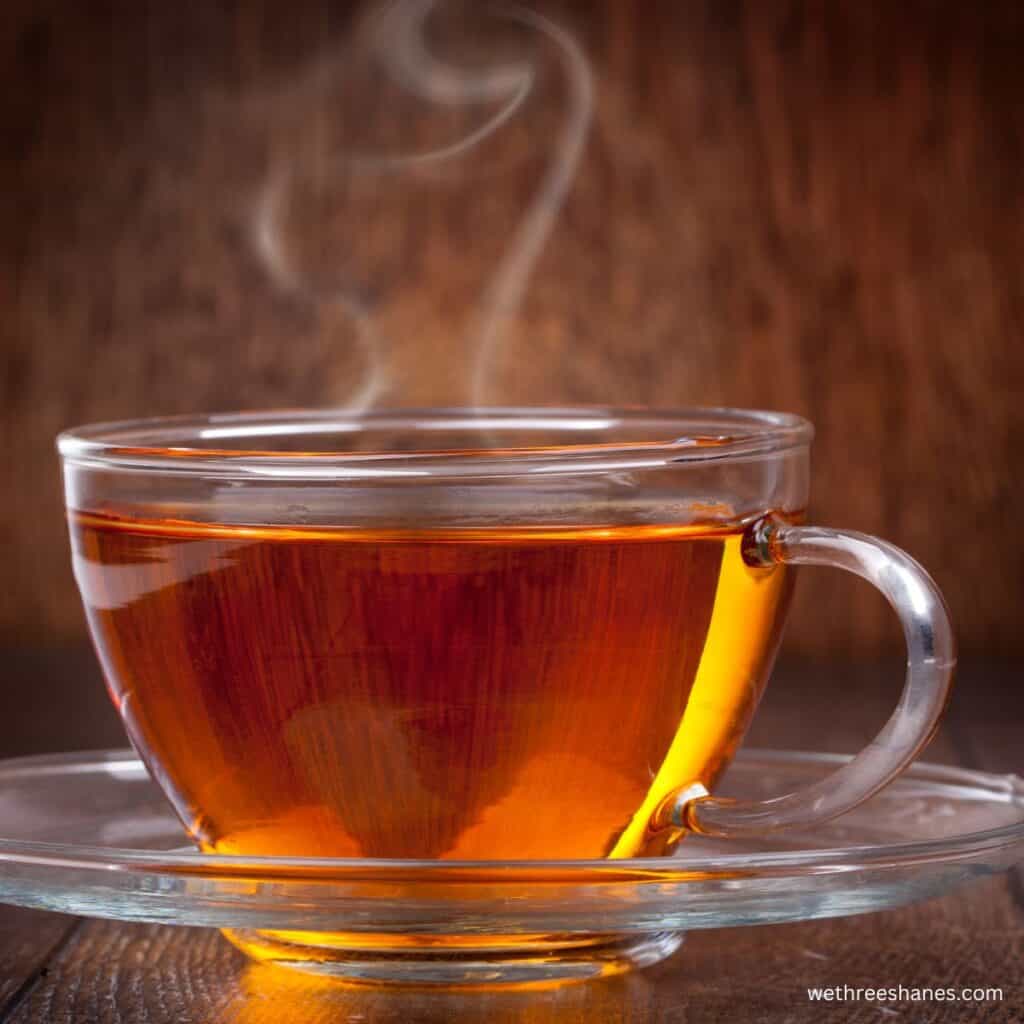 Hot cup of tea in a glass tea cup